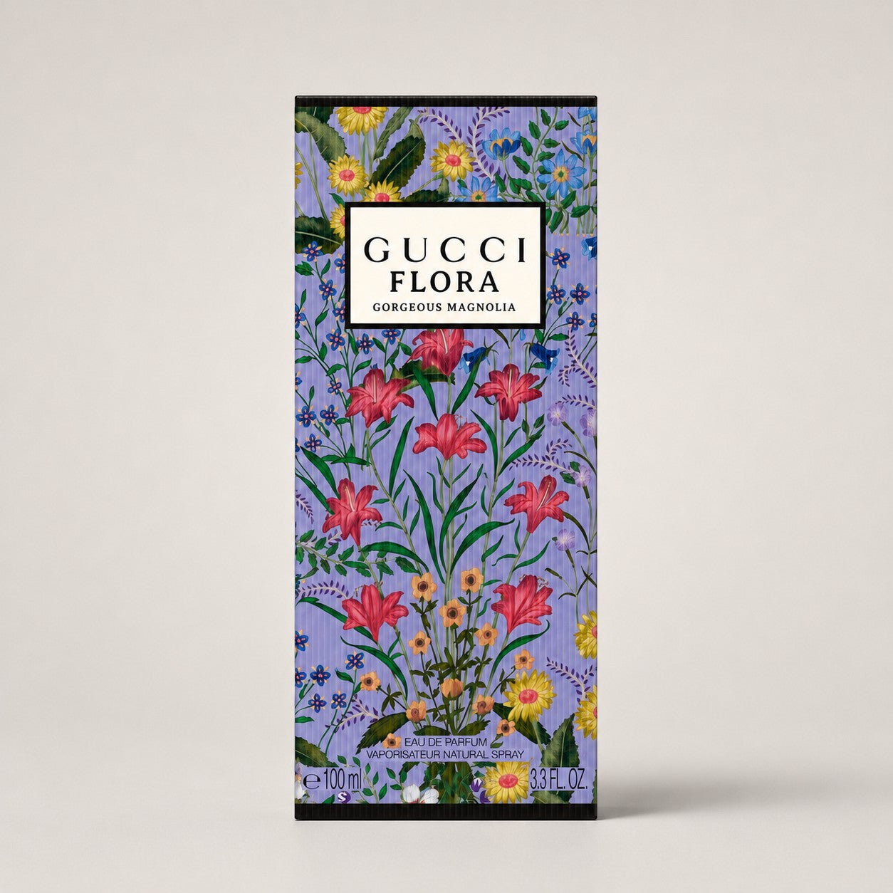 Caja de perfume Gucci Flora Gorgeous Magnolia de Ricky Luxury con estampado floral colorido sobre fondo morado