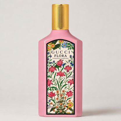 Perfume Gucci Flora Gorgeous Gardenia de Ricky Luxury en frasco rosa con diseño floral colorido y tapón dorado