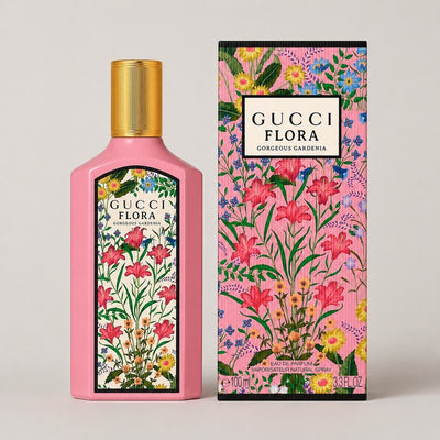Perfume Gucci Flora Gorgeous Gardenia de Ricky Luxury en frasco rosa con diseño floral y caja a juego