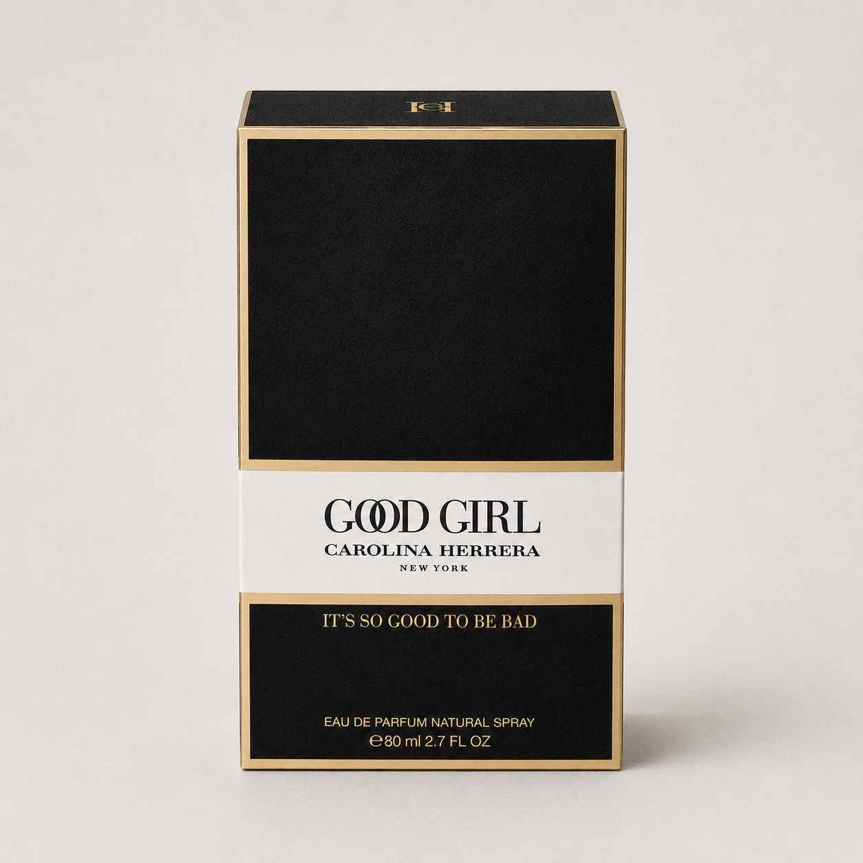 Caja de perfume Carolina Herrera Good Girl Negro de Ricky Luxury con diseño elegante en negro, blanco y detalles dorados.