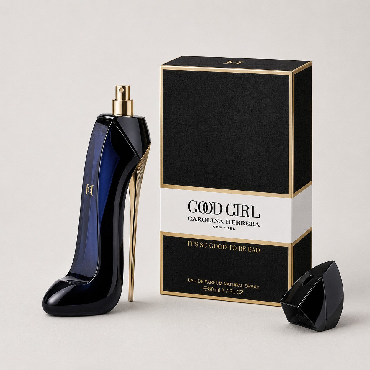 Perfume Good Girl de Carolina Herrera en Ricky Luxury, frasco azul oscuro con forma de tacón y caja elegante