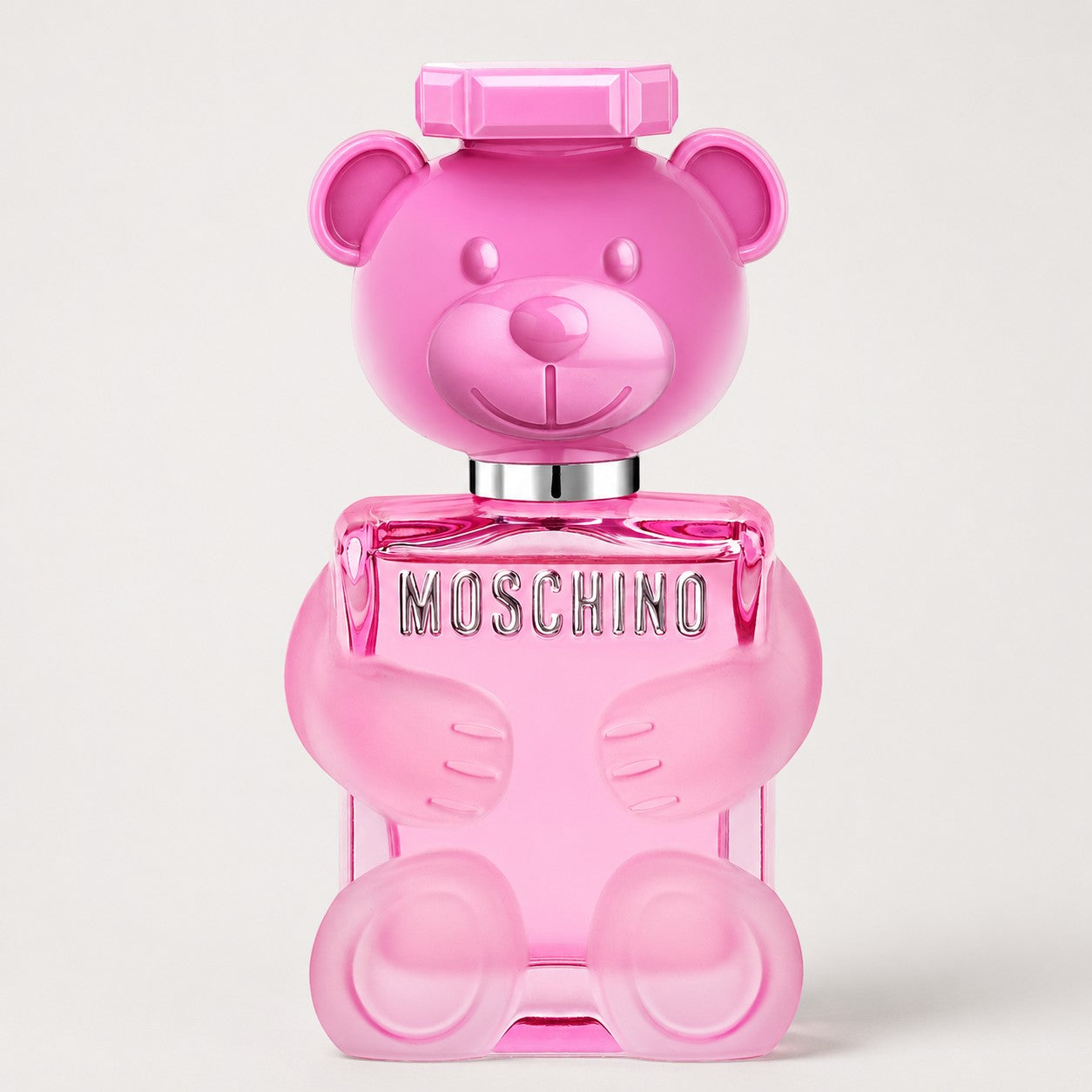 Perfume Moschino Toy 2 Bubble Gum de Ricky Luxury en frasco de cristal rosa con forma de oso de peluche