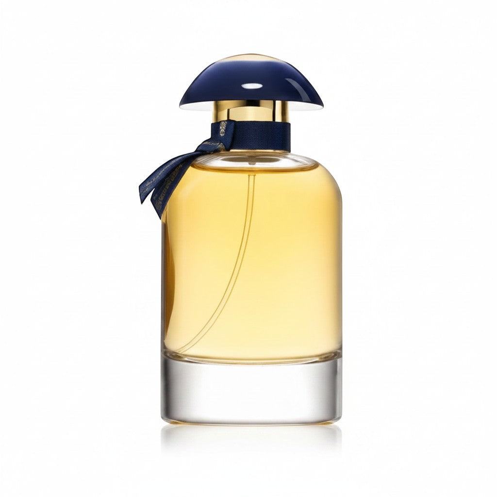 Perfume Lattafa Ra'ed Luxe de Ricky Luxury en frasco de cristal con tapón azul y detalle de lazo