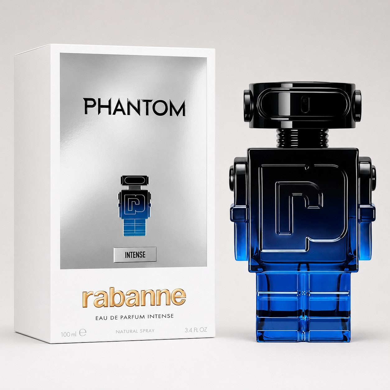 Perfume Paco Rabanne Phantom Intense de Ricky Luxury en frasco con forma de robot azul degradado y caja plateada